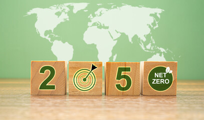 Wooden cubes with text 2050 and Nt-zero icons on a wooden table