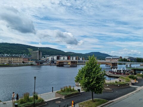 Beautiful shot of a Drammen city bridge, with cloudy blue sky in the background, Viken, Norway