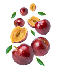 Red cherry plum fruit with green leaves and cut in half sliced flying in the air isolated on white background. 