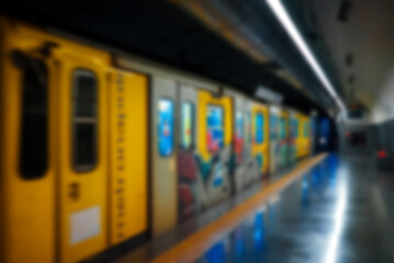 Train metro station in the subway. Blurred image.
