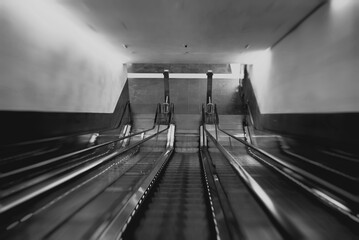 Electric escalator in metro. Moving staircase.