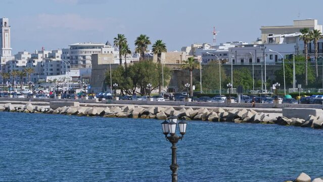 Bari seafront lights. Coastline and Twilight purple and blue sky