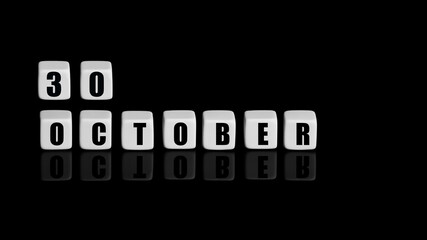 October 30th. Day 30 of month, Calendar date. White cubes with text on black background with reflection. Autumn month, day of year concept