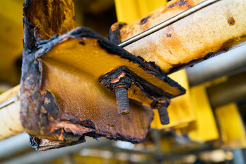 The steel supporting the pipe was severely corroded, both the nut and the screw.