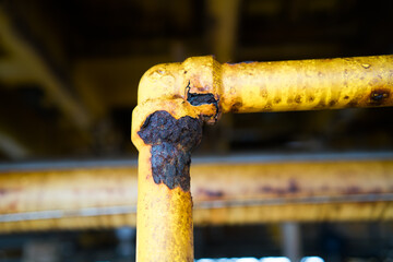 Close-up of corroded steel pipe, corrosion of steel, general corrosion, offshore petroleum pipelines.