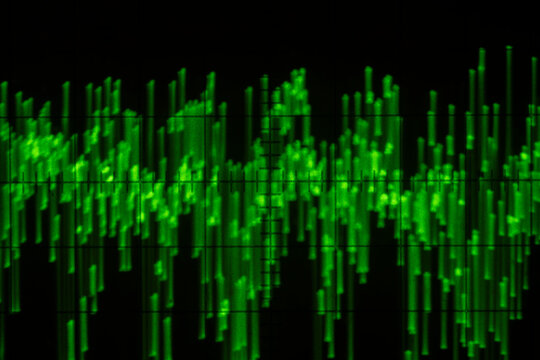 Audio signal on oscilloscope screen. Communication and electronics. Close up