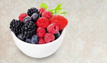 Fresh ripe set of berry on kitchen desk.