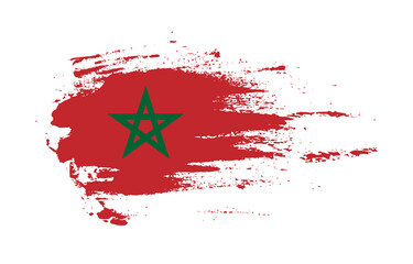 Grunge brush stroke flag of Morocco with painted brush splatter effect on solid background