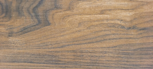 Fototapeta premium light rustic wood background with dark veins on natural panel