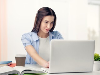 Young business woman work on computer at office
