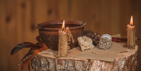 Candle burns on the altar, candles magic, clean aura and negative energy, wicca concept