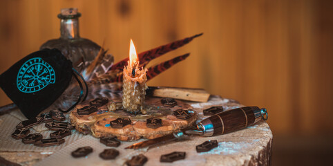 Candle burns on the altar, candles magic, clean aura and negative energy, wicca concept