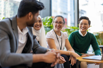 Multi-ethnic business group in an office building
