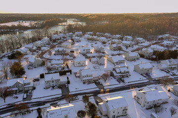 This small town in New Jersey, residential housing complexes have their roofs dusted with snow after severe snowstorm hit area