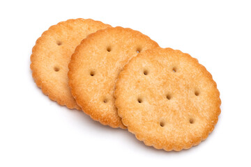 Healthy whole wheat cracker on white background. Stack of Saltine crackers isolated on white background. Round crackers.