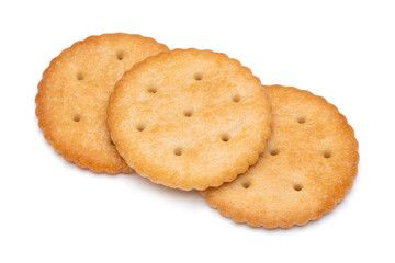 Healthy whole wheat cracker on white background. Stack of Saltine crackers isolated on white background. Round crackers.