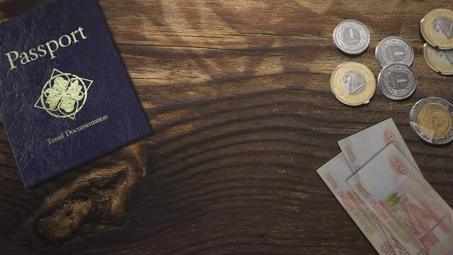 Travel passport with paper and coin money on wood table, motion promotion, summer and travel style background