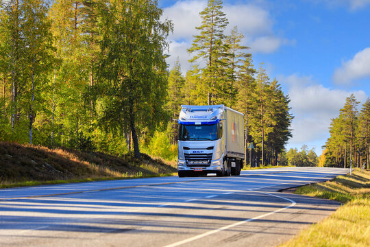 Road Landscape with New Silver DAF XG+ 530 Truck Semi Trailer. Plenty of Copy Space. 