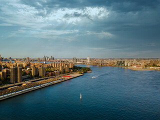 Fototapeta premium This panoramic perspective view Manhattan skyline over on the East River horizon is from an aerial point view of city