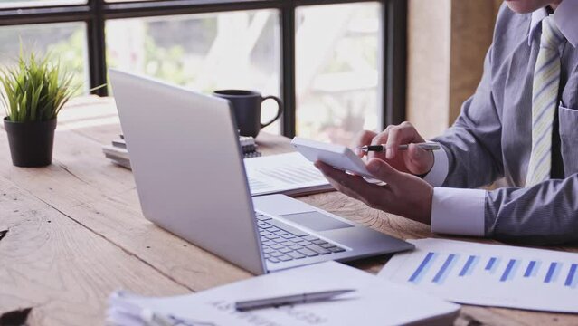 The financiers are calculating personal taxes for their customers.