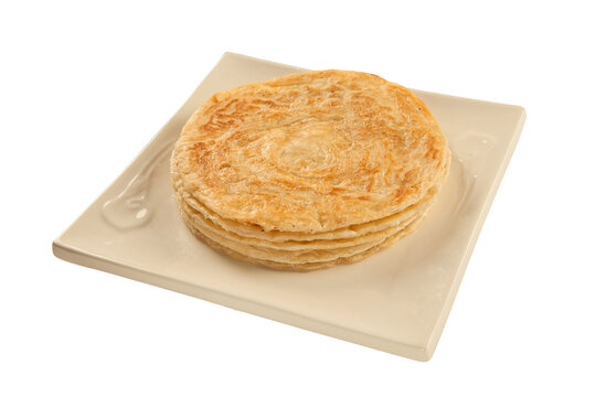 Puri paratha stack on plate isolated on a white background