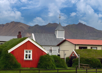 Fototapeta premium The charming village and church of Borgarfjörður eystri, Eastern Iceland