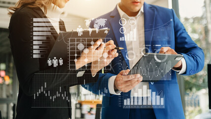 Financial report data of business operations balance sheet and income statement and diagram as Fintech concept.Business team meeting. digital tablet and  laptop..