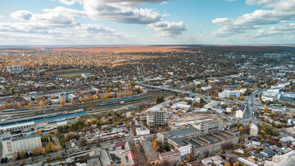 Industrial city part aerial view. Kharkiv railway station depot in autumn, transport intersection rooftop in Kharkiv, Ukraine