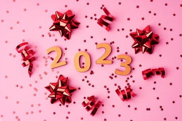 Christmas, winter, new year concept. Merry Christmas and Happy New Year. Christmas, winter, new year concept. Holiday. Happy New Year 2023 poster. Christmas background with big gold 2023 numbers. 