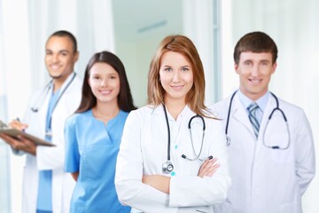Fototapeta premium Medical team of doctors on hospital background