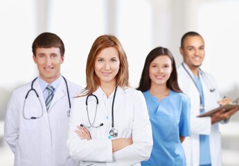 Medical team of doctors on hospital background