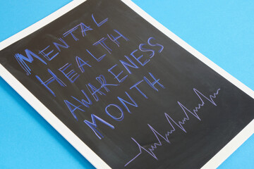 mental health awareness month concept, inscription on board