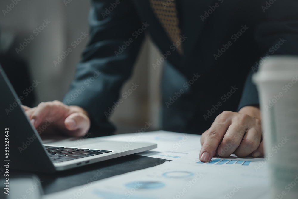 Aufkleber businessman hand pointing paperwork chart report analysis statistic and document financial graph wit