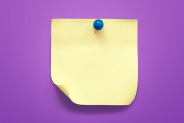 Yellow blank paper note on office desk