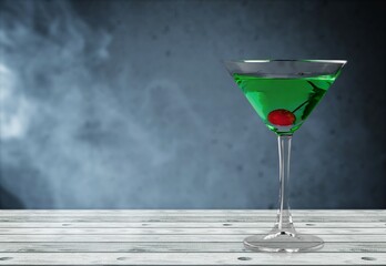 Tasty alcohol sweet martini drink in glasses