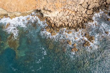 Bird's eye view of waves on seashore