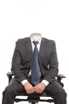 Businessman without a head. A symbol of impersonality and lack of individuality. Businessman mock up. Isolated