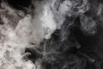 White steam on a black background.