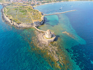 Aerial drone view of the venetian castle and the octagonal tower called Bourtzi in Methoni, Messenia, Peloponnese, Greece
