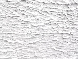 Cracked white paint on the wall