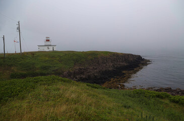 Fototapeta na wymiar Grand Passage Lighthouse in the fog, Nova Scotia
