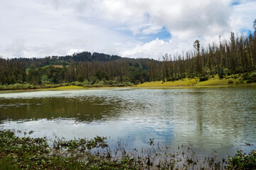 Beautiful Ooty lake with its scenic beauty against blue sky forming a beautiful background