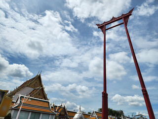 Giant Swing is an architecture made of teak painted in red, built for use in the Brahmin-Hindu ceremonial swing.Located in front of Wat Suthat Thepwararam now a tourist attraction of Bangkok,Thailand