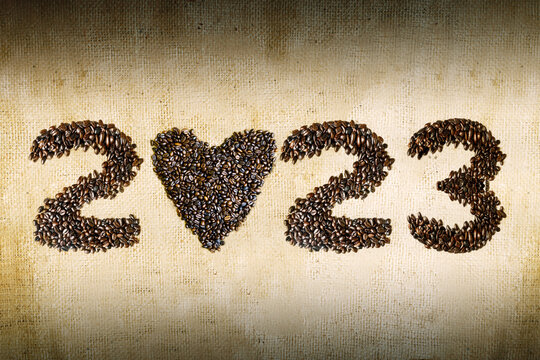 Coffee beans shaped 2023 numbers and heart symbol - Powered by Adobe