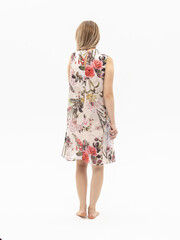 Woman in sleeveless chiffon dress on white background. Summer dress for school, office. View from the back