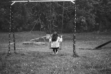 child on swing