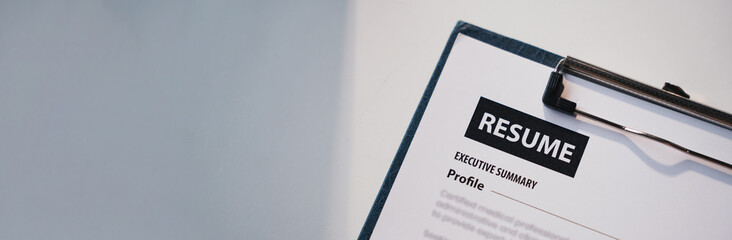 Businesswoman Holding Resume,Examiner reading a resume during job interview at office Business and...