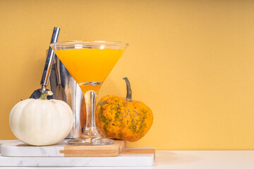 Halloween, Thanksgiving or fall cocktail pumpkintini cocktail. Sweet pumpkin martini, festive...