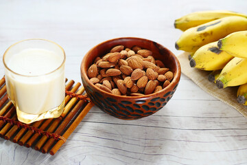  almond nut and milk on table 