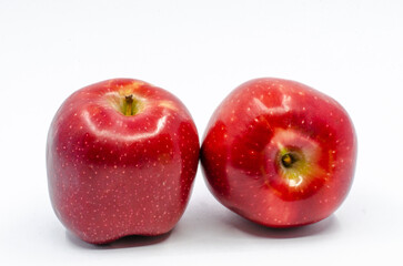 Red apples. Red colored apples isolated on white background. front view.
